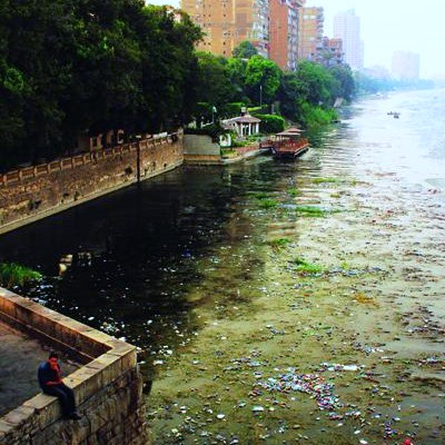 Garbage flows along the Nile, Egypt's most precious commodity [JOHN CHAPMAN]