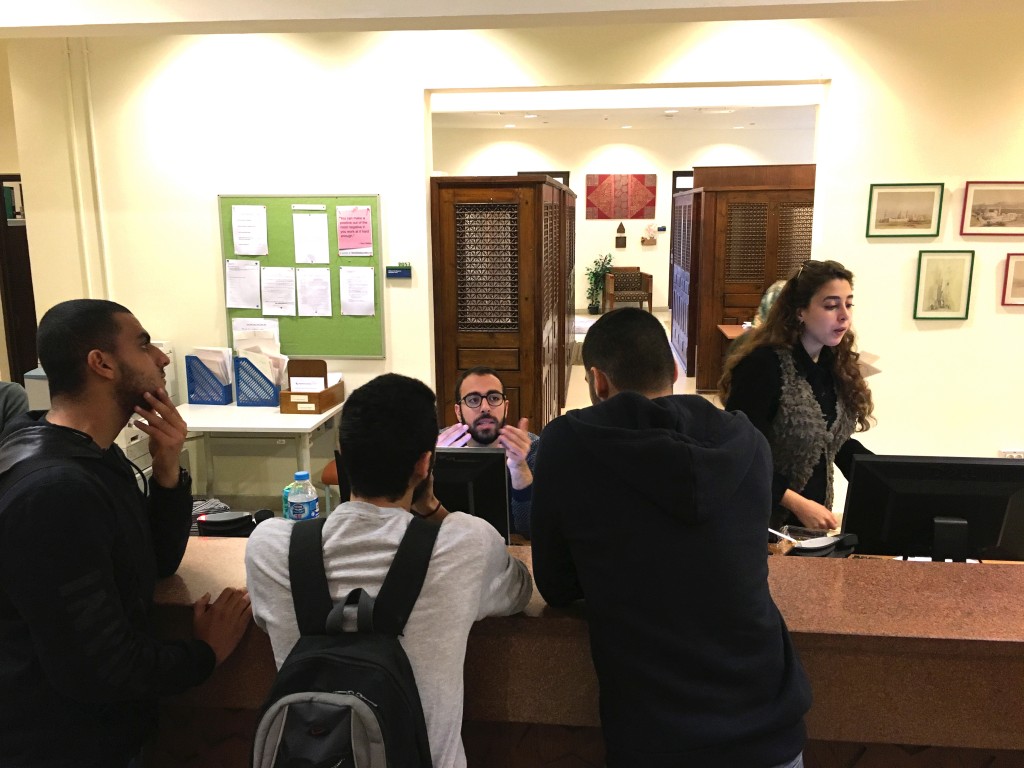 Students seeking information at the Registrar's office  [Suhayla Al Sheikh]